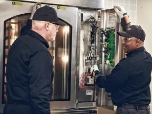 Hobart Service employees installing commercial food equipment